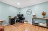 Office area with wood finished floors, ornamental molding, and recessed lighting