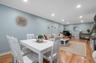 Dining area featuring recessed lighting, ornamental molding, and light wood-type flooring
