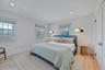 Bedroom featuring light wood-style flooring and recessed lighting