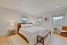 Bedroom with light wood-type flooring and recessed lighting