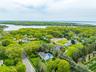 View of property location featuring a nearby body of water and property parcel outlined