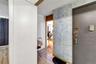 Corridor with wallpapered walls