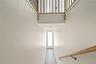 Stairs with a towering ceiling