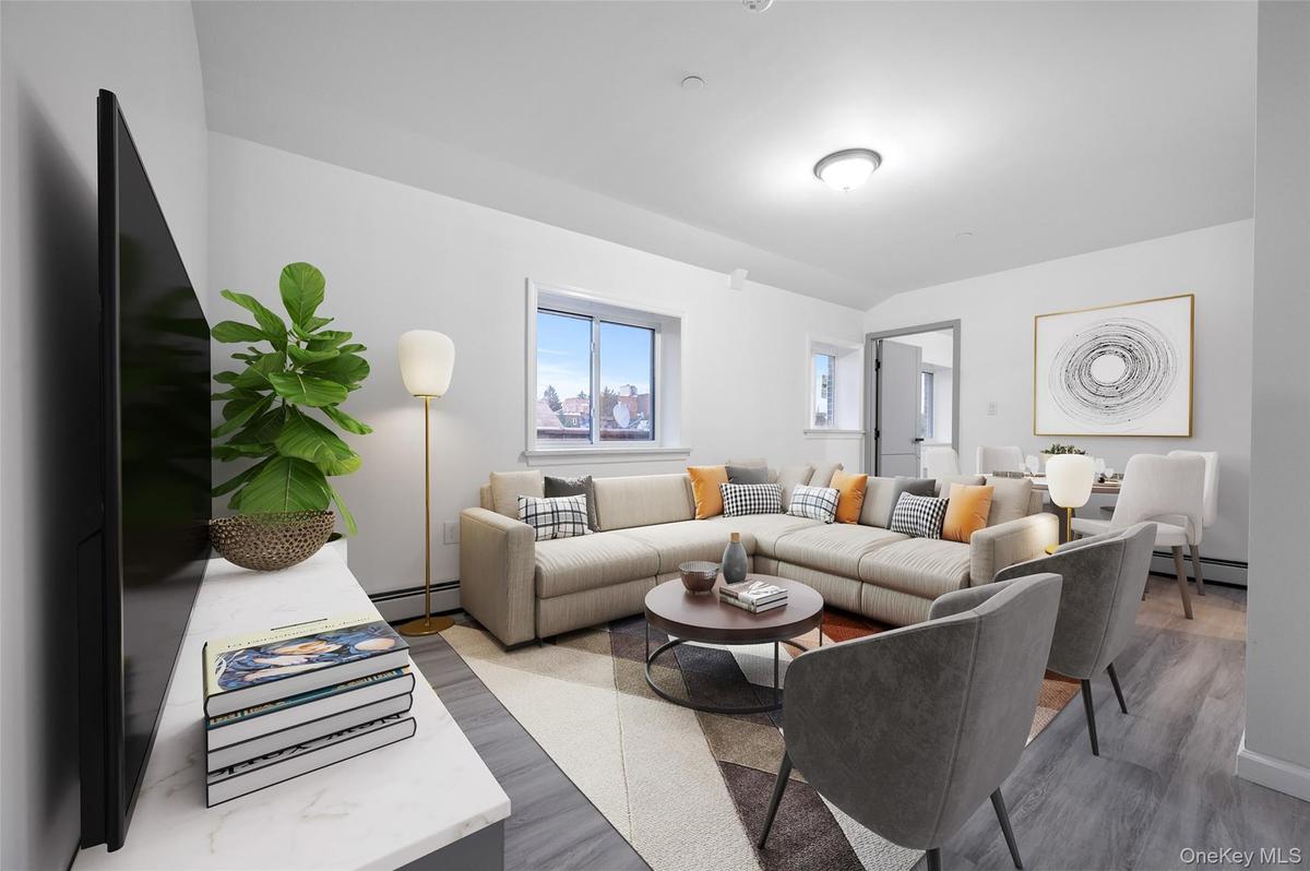 Living area featuring a baseboard radiator