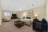 Virtually Staged Carpeted bedroom with recessed lighting