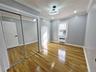 Unfurnished bedroom with light wood-style flooring, a closet, ornamental molding, radiator heating unit, and recessed lighting