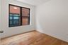 Empty room featuring light wood-style floors and baseboards