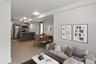 Living room featuring light tile patterned floors