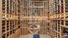Wine room with tile patterned flooring