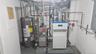 Utilities featuring water heater, a heating unit, and electric panel