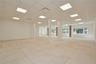 Unfurnished room featuring a drop ceiling