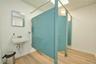 Bathroom with light wood finished floors and baseboards