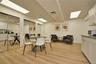 Dining room featuring a paneled ceiling and light wood-style floors