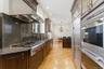 Kitchen with granite counters and backsplash