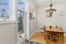 Light filled Dining area featuring hardwood floors