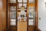 Leaded glass pocket doors leading into dining room