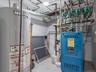Utilities with gas water heater and a heating unit