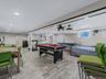 Game room featuring wood finish floors, recessed lighting, and pool table