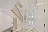 Entrance foyer with recessed lighting, stairs, french doors, and light marble finish floors