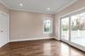 Spare room with wood finished floors, recessed lighting, and ornamental molding