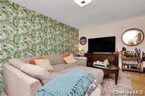 Living area with wood finished floors
