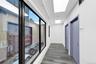 Hallway featuring wood finished floors