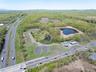Aerial view with a water view and a forest view