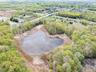 Bird's eye view featuring a water view and a forest view