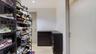 Walk in closet featuring light wood-style floors