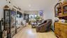 Living room featuring light wood-style floors and recessed lighting