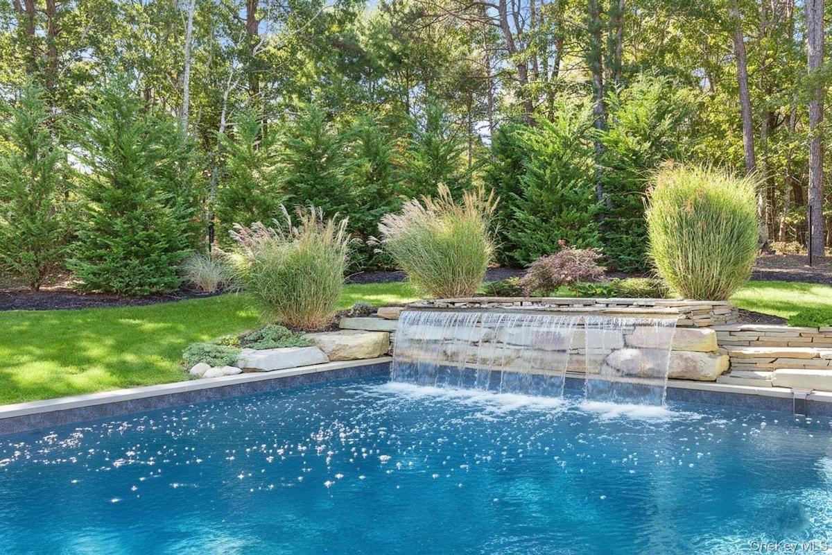 Swimming pool featuring a yard