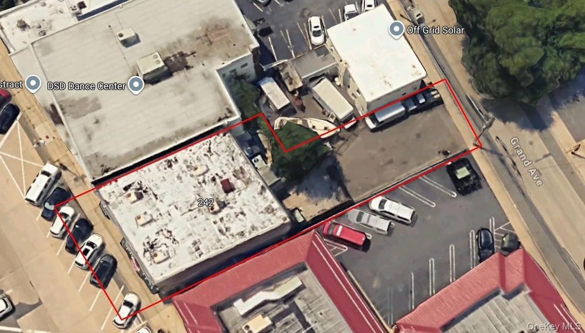 Aerial map of property and surrounding area with property parcel outlined