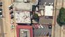 Aerial overview of property's location with property parcel outlined