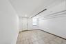 Unfurnished room with recessed lighting and light tile patterned flooring