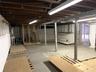 Unfinished basement featuring electric panel
