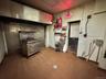 Kitchen featuring high end stainless steel range