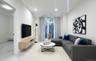 Living area featuring marble finish floors and a baseboard heating unit