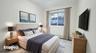 Bedroom featuring a baseboard radiator