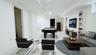 Recreation room featuring pool table, built in features, and light marble finish flooring