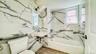 Full bathroom with tub / shower combination and a sink