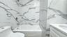 Bathroom with vanity and  shower combination