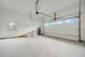 Garage featuring a garage door opener. For Marketing Purposes!