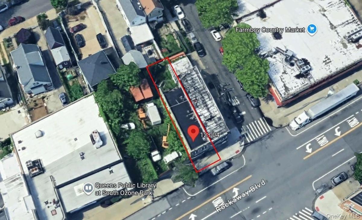 Aerial overview of property's location featuring property boundaries highlighted
