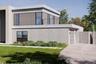 View of side of property with stucco siding and a lawn