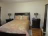 Bedroom featuring wood finished floors