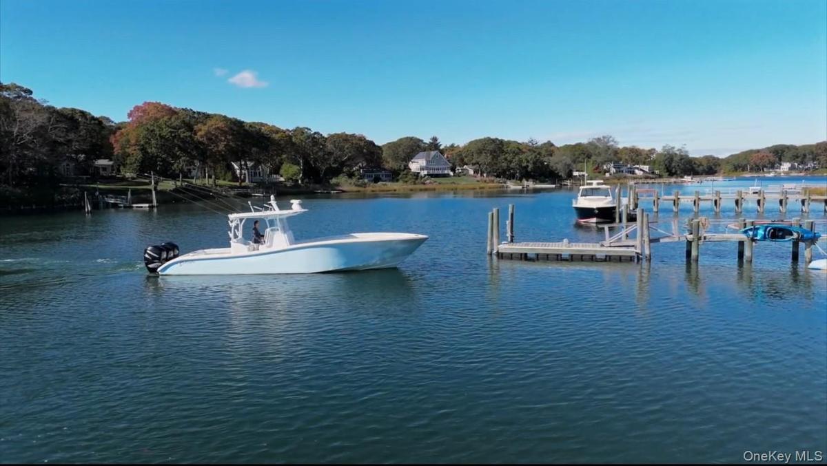Deepwater dock for multiple boats and easy access to Peconic Bay