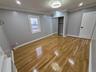 Unfurnished bedroom with wood finished floors, ornamental molding, recessed lighting, and a closet