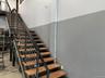 Stairway featuring concrete floors
