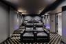 Cinema room featuring carpet and recessed lighting