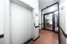 Corridor featuring elevator